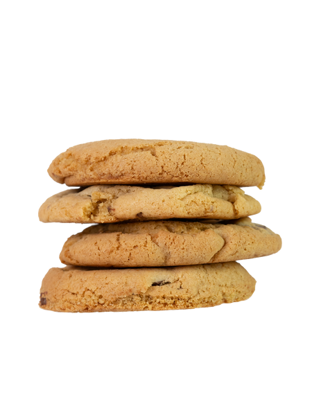 A stack of four golden-brown chocolate chip cookies.