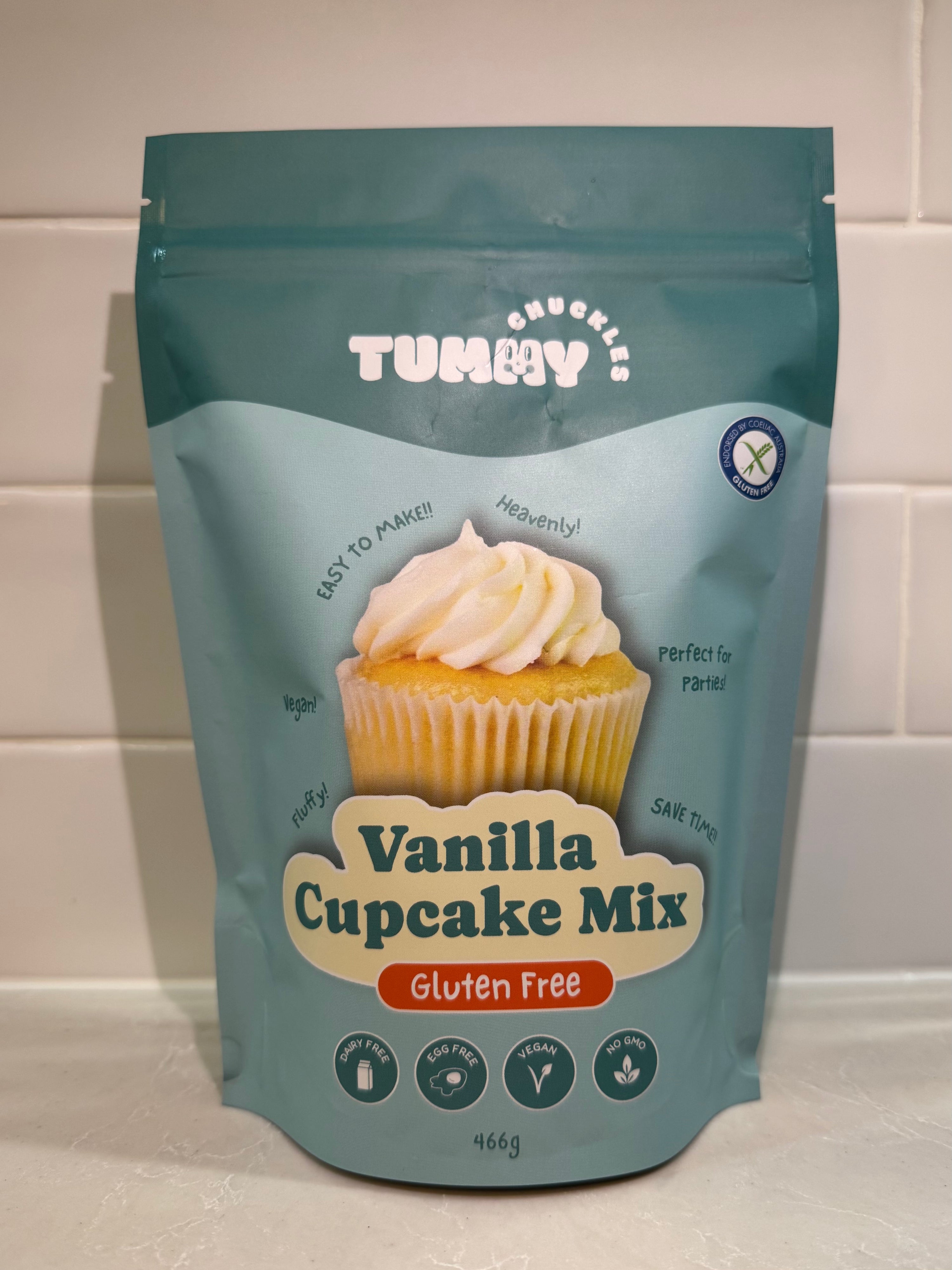 Vanilla Cupcake Mix package on a white tiled background